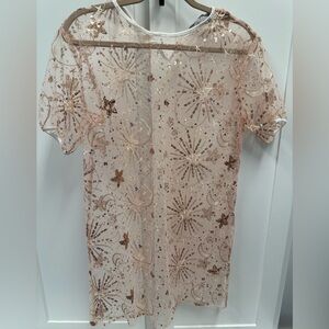 Sheet tunic with sequin pattern